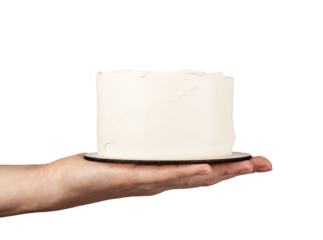 Hand holding bento cake mockup, tiny sweet dessert on palm isolated on white background