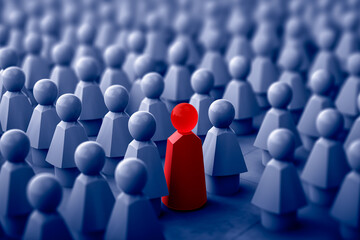 One red figure emerges in a crowd of blue, symbolizing the concept of finding the right person in HR, leadership in business, and individuality in corporate strategy.