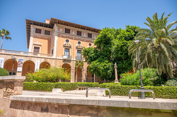 Fototapeta na wymiar Palma de Mallorca, Spain - July 28, 2023: Amazing Royal Palace of La Almudaina in Palma.