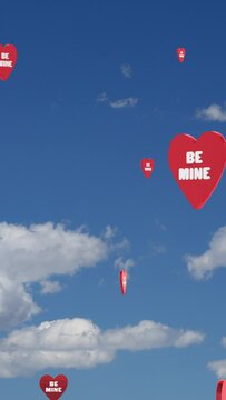 Vertical Video Valentines Day Be Mine Flying Candy Hearts in Sky