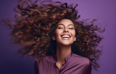 Ecstatic young woman with flowing brown hair