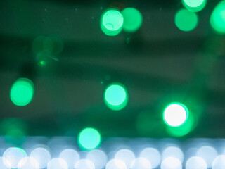 Green blurred background for text or pictures. New Year holidayhite