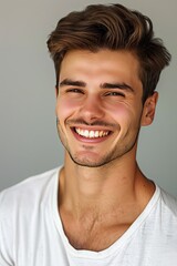 Fototapeta premium Smiling Man in White Shirt