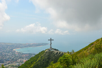 Cross on the mountain in Gelendzhik, panorama of the city of Gelendzhik and the bay