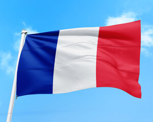 France flag fluttering in the wind on sky.