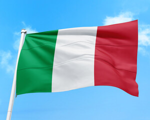 Italy flag fluttering in the wind on sky.