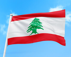 Fototapeta premium Lebanon flag fluttering in the wind on sky.