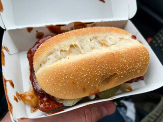 Juicy McRib from McDonald's in hand