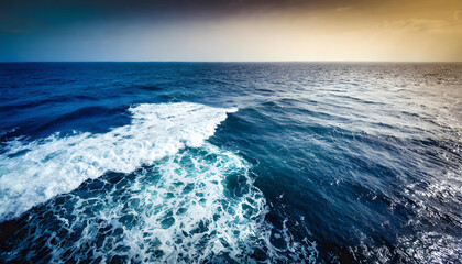 Aerial view of ocean waves. Blue water background