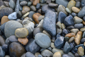 Fototapeta na wymiar sea ​​stones on the beach of Cyprus in winter 3