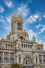 Fototapeta na wymiar Architectural fragments of Cibeles Palace (Palacio de Cibeles) in Plaza de Cibeles: Madrid City Council (formerly Palace of Communication), iconic monument of the city. MADRID, SPAIN.