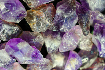 Rough purple amethysts with citrine. Mineral exchange. 