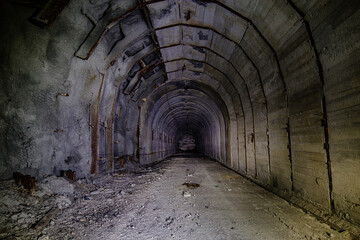 Dark tunnel at old underground bunker
