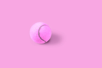 Pink tennis ball with shadow on a pink  background. Simple stop motion sport animation