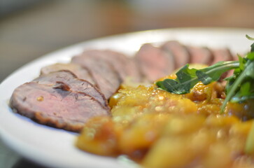 rosemary duck breast steak with vegetables and caramelized fruit