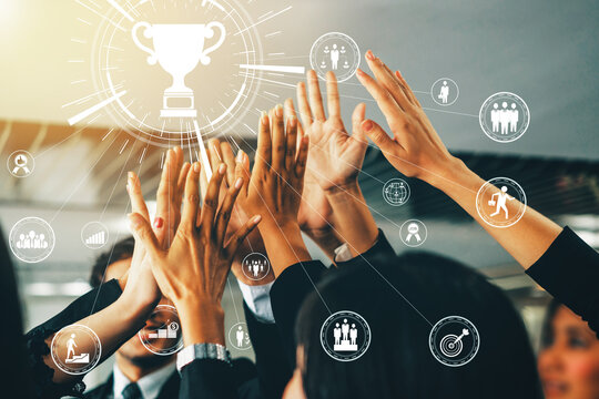 Achievement and Business Goal Success Concept - Creative business people with icon graphic interface showing employee reward giving for business success achievement. uds