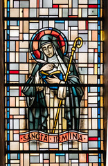 Fototapeta na wymiar Saint Irmina of Oeren. A stained-glass window in Église de la Sainte-Trinité (Holy Trinity Church) in Walferdange, Luxembourg.