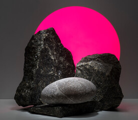 black stones for the podium against the background of a colored circle