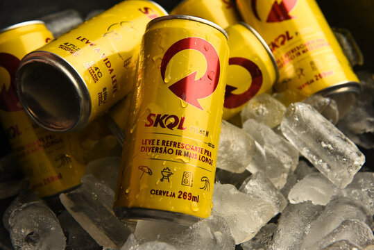 Skol beer cans on ice.