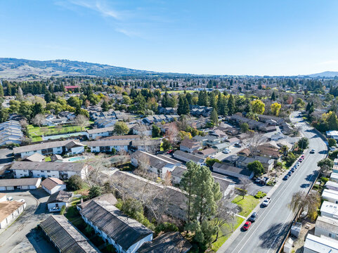 Aerial images over a community in Rohnert Park, California on a beautiful winter day with a blue sky