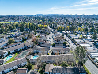 Aerial images over a community in Rohnert Park, California on a beautiful winter day with a blue sky
