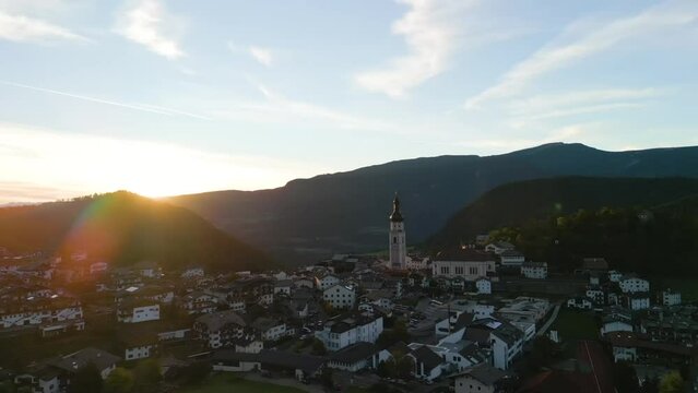Aerial video of a small town in the Dolomites, Italy