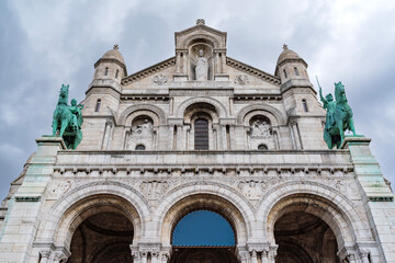 Fototapeta na wymiar front exterior view of sacred heart of jesus basilica in paris france at montmartre