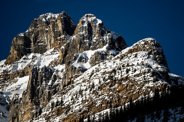 rugged peaks slightly covered in snow