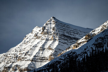 rugged peak with snow during winter