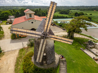 Guadeloupe, Habitation Bellevue rum distillery at Marie Galante with windmill amazing drone shot