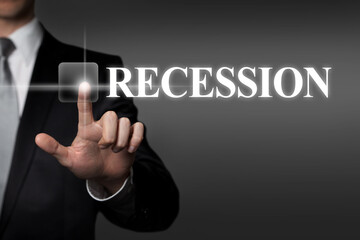 Recession - businessman pressing virtual touchscreen button