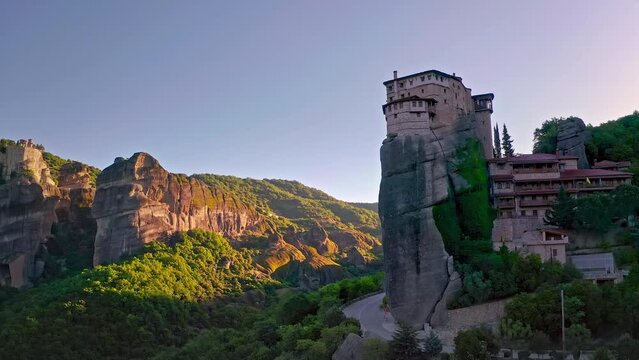 Picturesque nature and architecture of old monastery on mountain cliff top