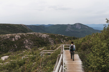 Boy hiking in the mountains