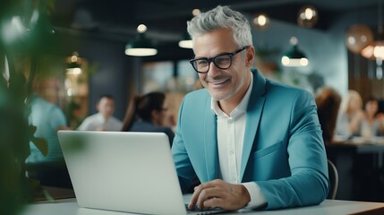 Caucasian male freelancer checking news remotely for publicity work on laptop computer