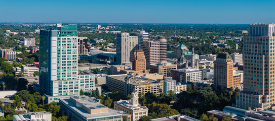 The Tower Bridge in Sacramento, California with the city of of Sacramento in the background and...