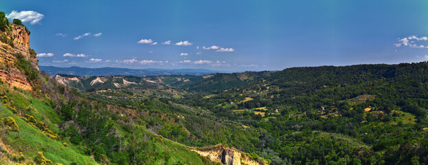 Civita di Bagnoregio comune, town, and surrounding landscape view in the Province of Viterbo in the Italian region of Lazio, Italy 2023 - obrazy, fototapety, plakaty