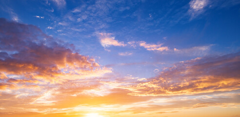 Sunset clouds are gathering. Panoramic sunrise or sunset sky with clouds. Sunset Sky on Twilight in...