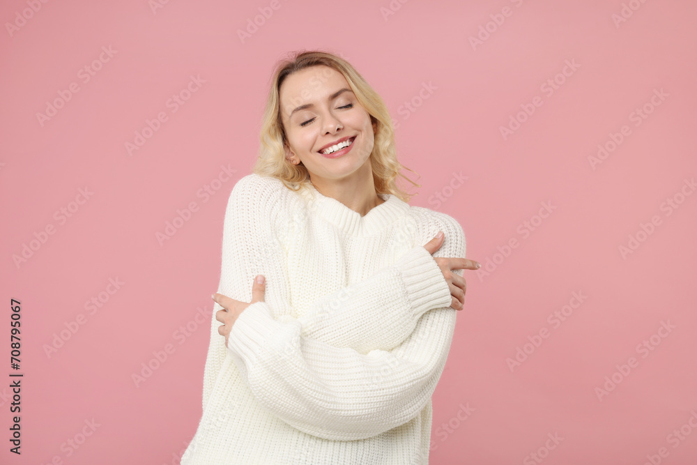 Sticker Happy woman in stylish warm sweater on pink background