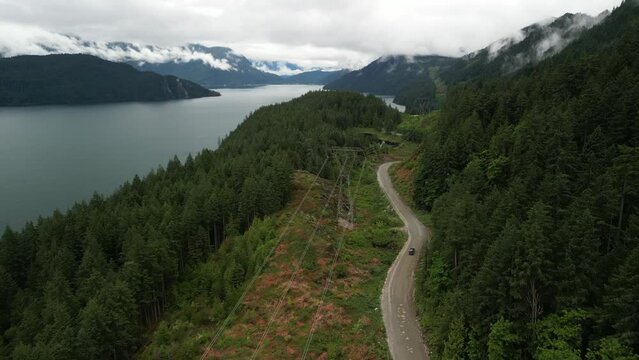 Aerial view of the road, for a car driving through the beautiful scenery of Squamish 