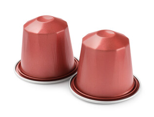 Two plastic coffee capsules isolated on white