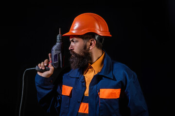 Engineer man, builder with building equipment. Safety helmet. Renovation. Man in hardhat. Heavy work. Labor day. Builder working. Hard job. Construction man, worker contractor foreman workman.
