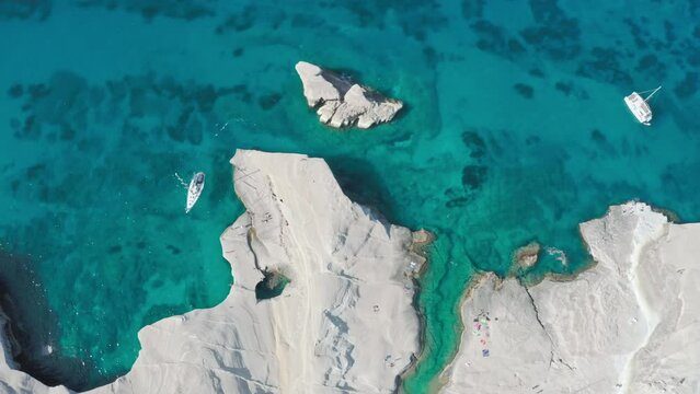 Cruise boats travel in greece. Milos island coast