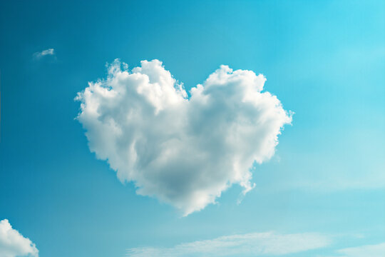 white cloud in heart shape on blue sky for love or valentine's day concept