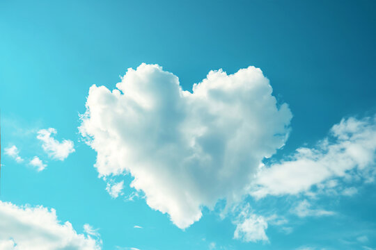 white cloud in heart shape on blue sky for love or valentine's day concept
