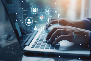Hands Typing on Laptop with Digital Icons.
Close-up of hands on a laptop keyboard with virtual communication icons.