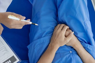 Doctors are counseling a young man about prostate cancer, venereal disease and sexual dysfunction....