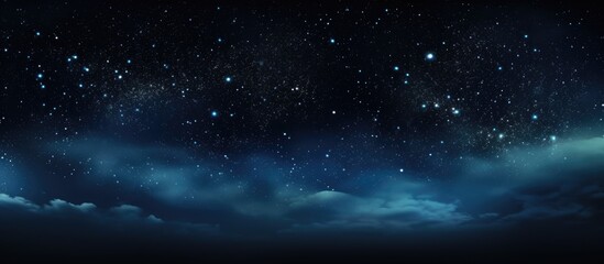 Fototapeta na wymiar Stars in the dark sky as a backdrop with blank area