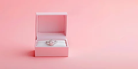 Poster Box with wedding ring isolated on pink background, engagement ring, dating ring, valentine's day © Kaleb
