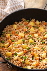 Pineapple fried rice with eggs, carrots and peas