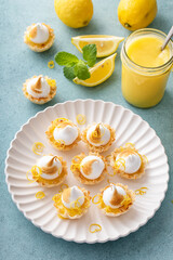 Little lemon meringue tartlets with filo pastry base